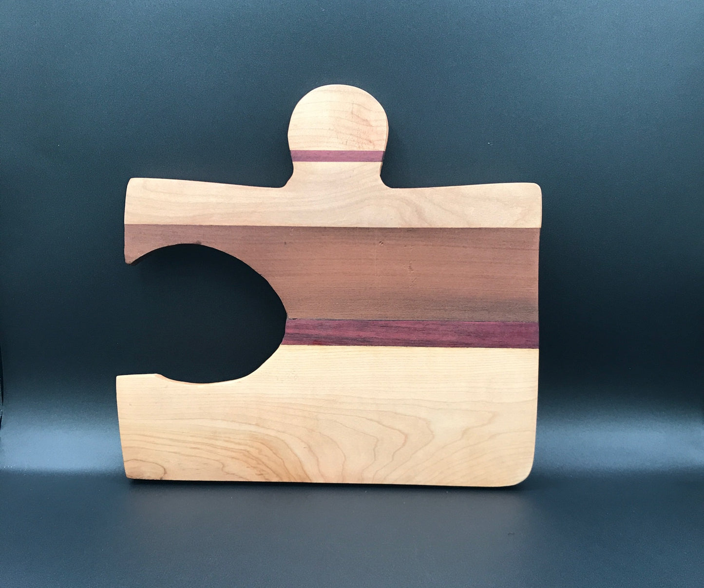 Puzzle Piece Board with Maple, Purpleheart, Walnut